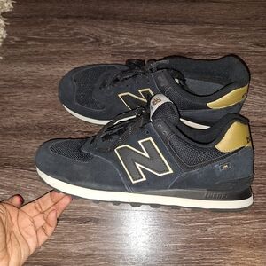 New Balance Black and Gold Sneakers